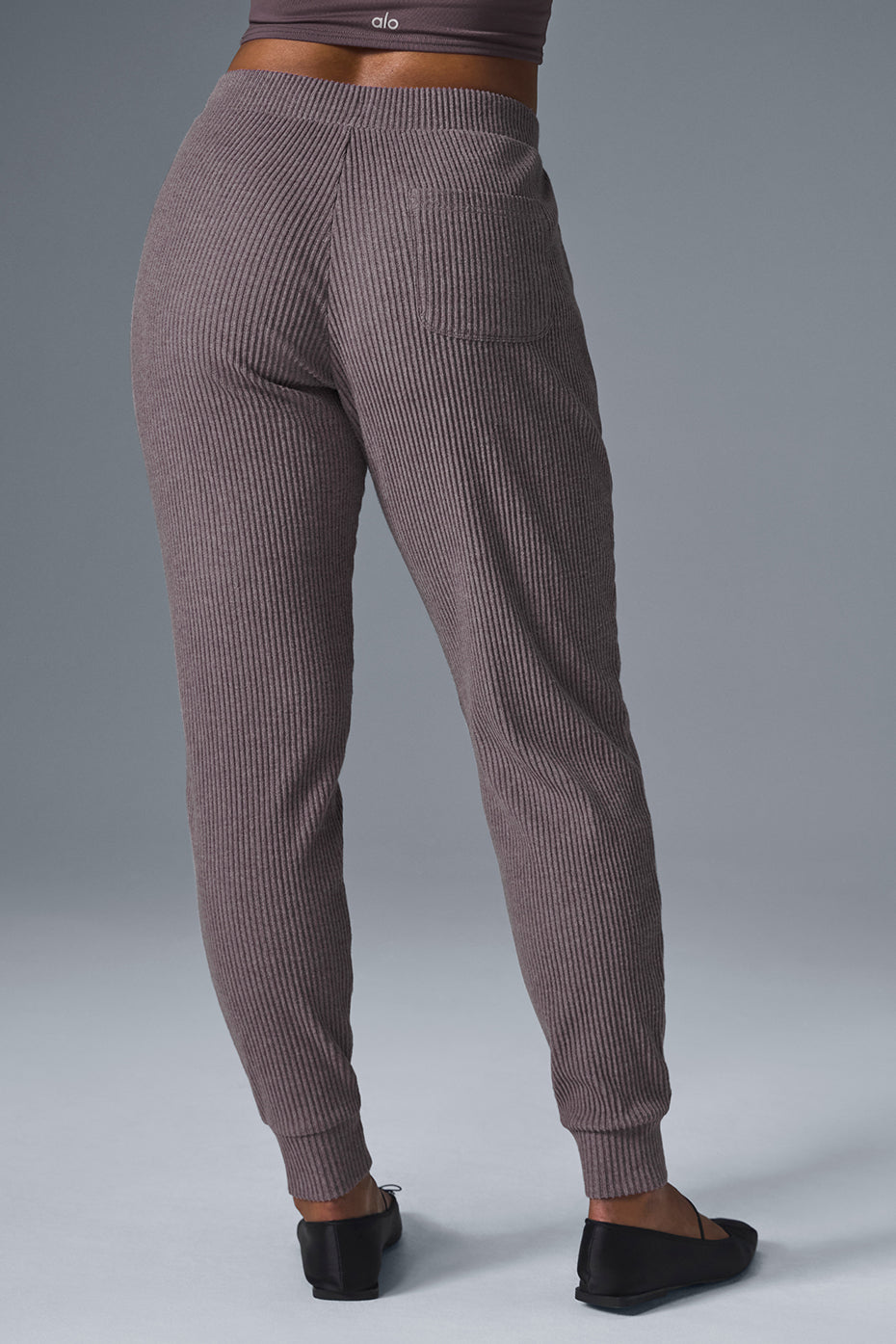 Close-up of wide leg sweatpants waistband and texture in Raisinette Heather color.