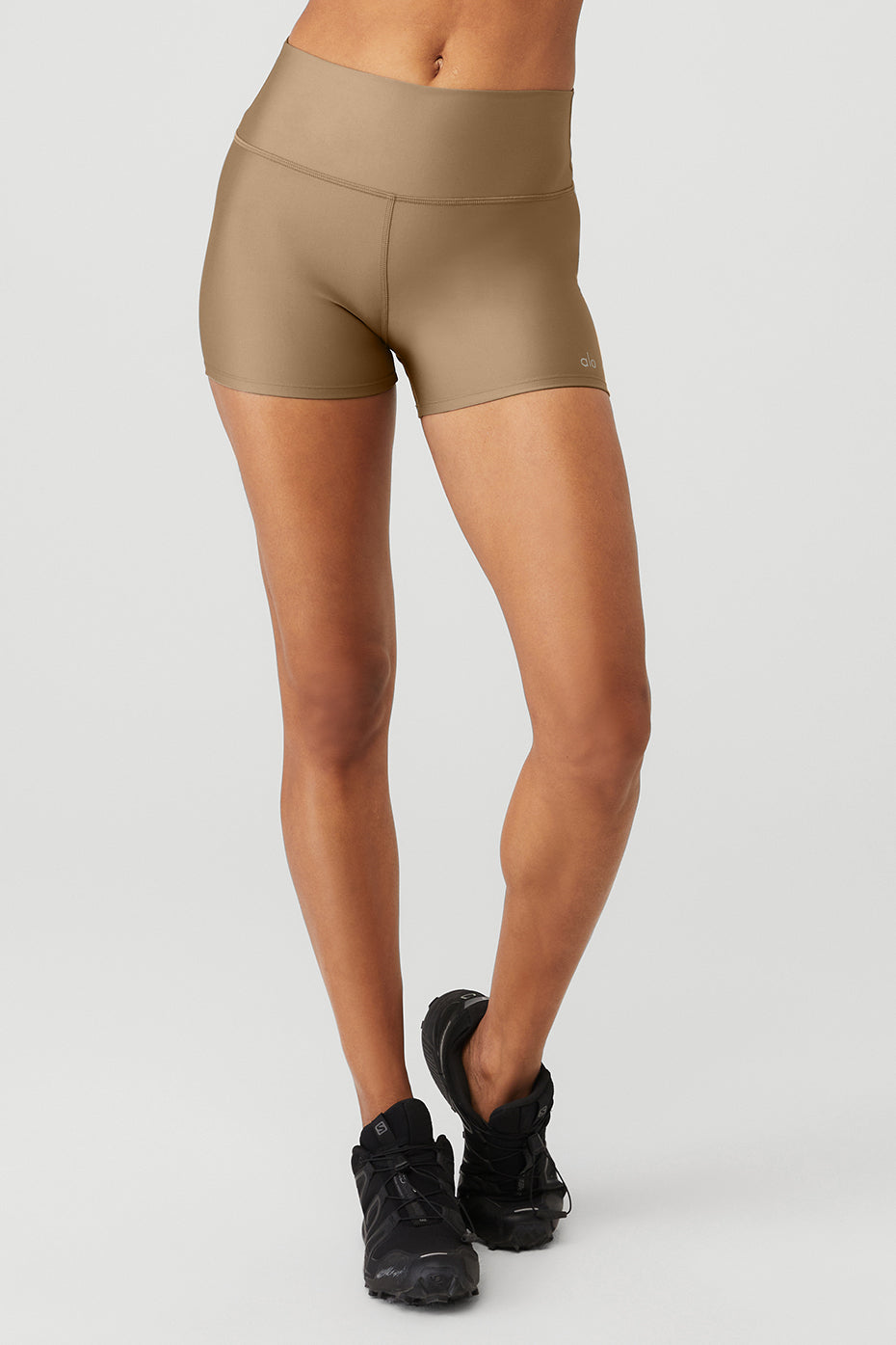 Front view of high-waist workout shorts with shiny finish for women