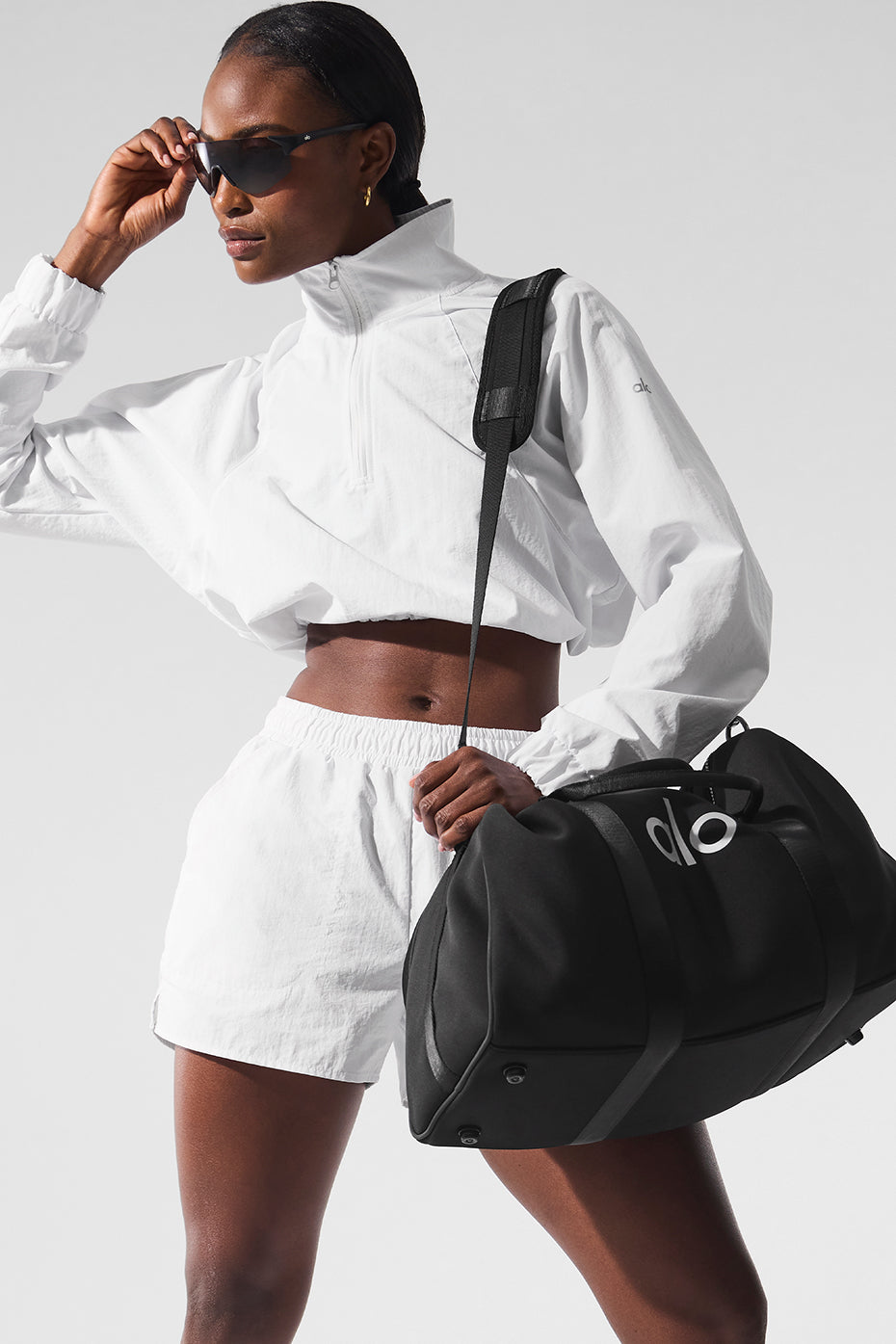 Side angle showing slit pockets and drawcord on high waist shorts