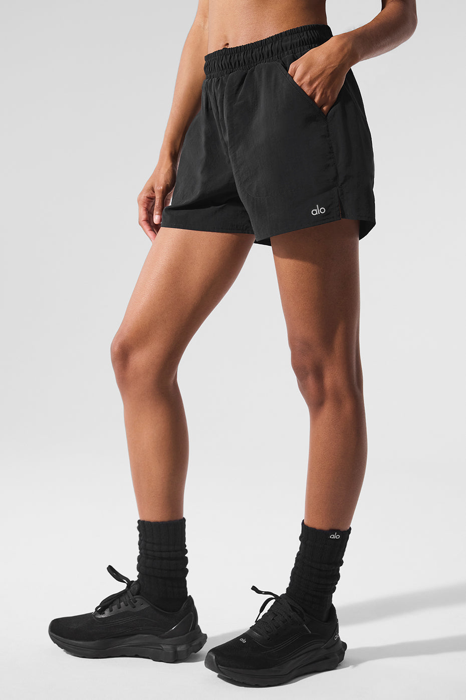 Back view of high-waisted shorts paired with a cropped tank