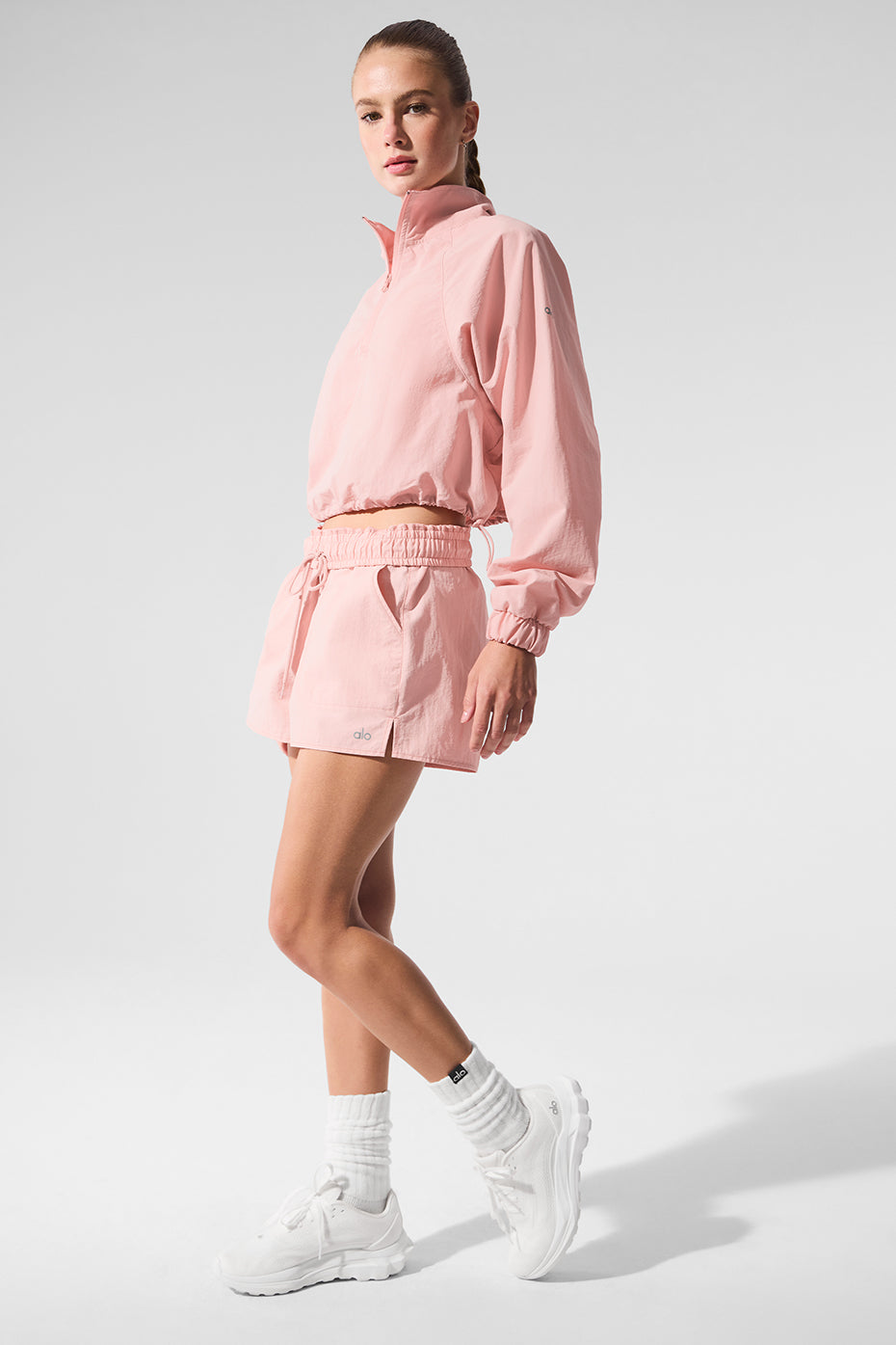 Side view of high-waisted sports shorts during a hike.