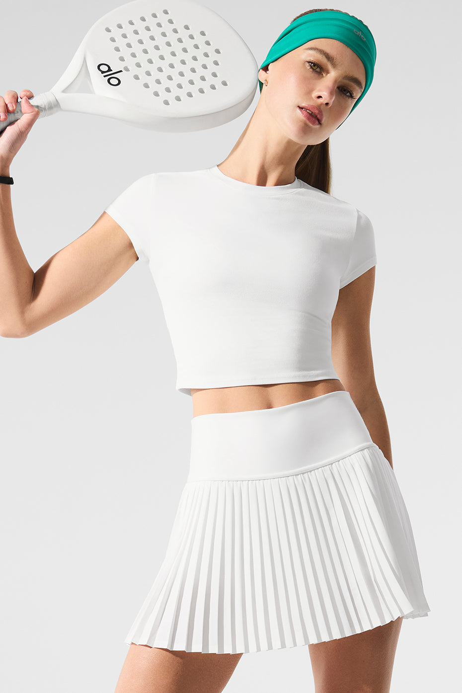 Front view of the white pleated tennis skirt showcasing its stylish design.
