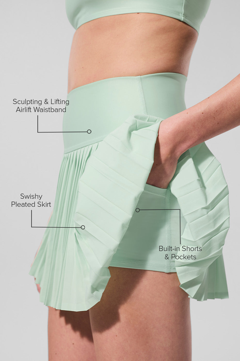 Side view showcasing the built-in shorts of the Grand Slam skirt.