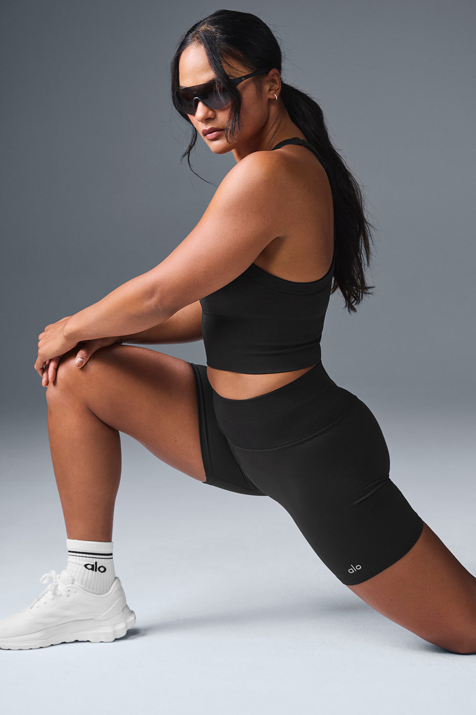 Close-up of the high-rise waistband and ribbed fabric texture.