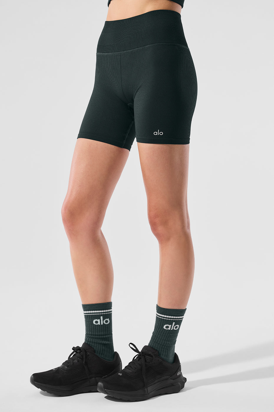 Side view showcasing the ribbed texture of high-rise biker shorts for women.