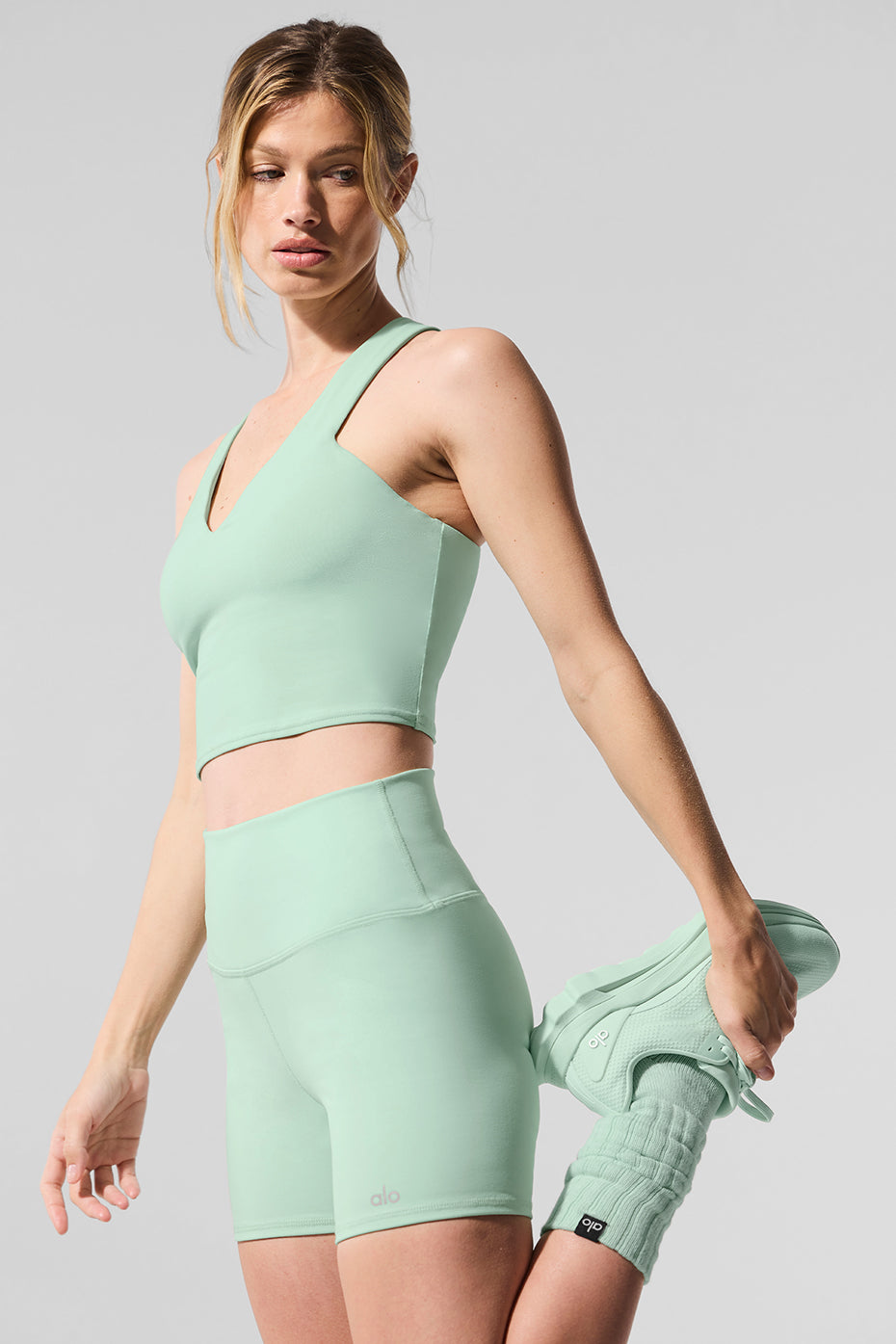 Close-up of spearmint biker shorts fabric texture and waistband