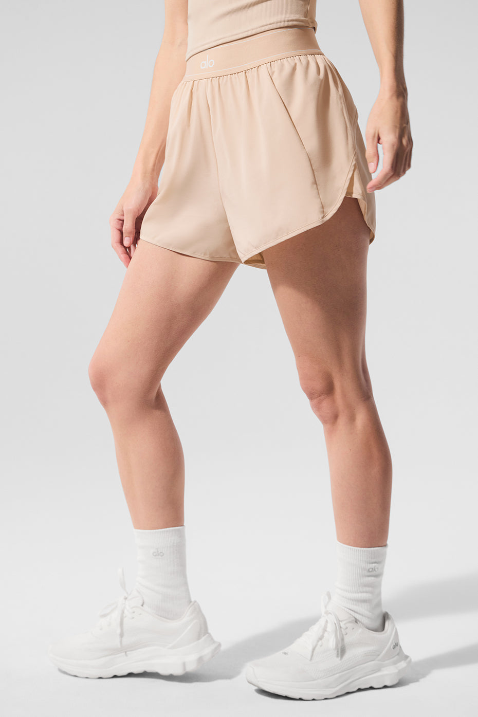 Back view of womens tennis shorts featuring an invisible pocket for essentials.