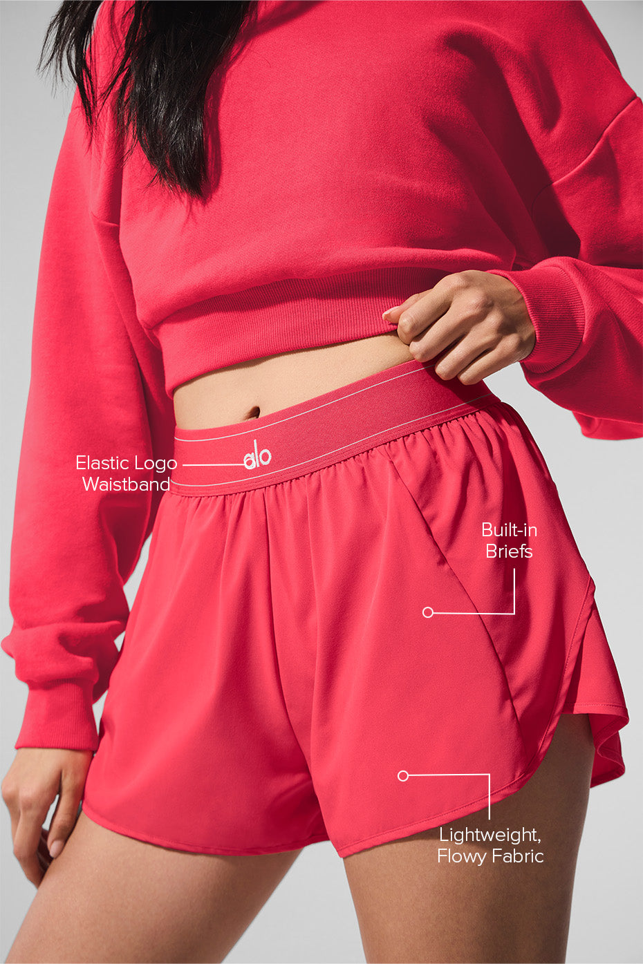Close-up of the lightweight woven fabric of mens athletic shorts with pockets