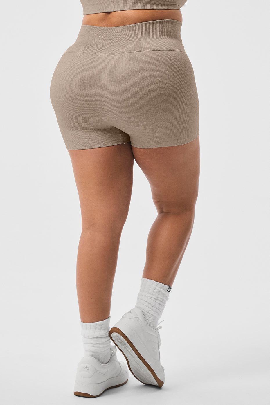 Side angle of shimmer shorts demonstrating fit and comfort
