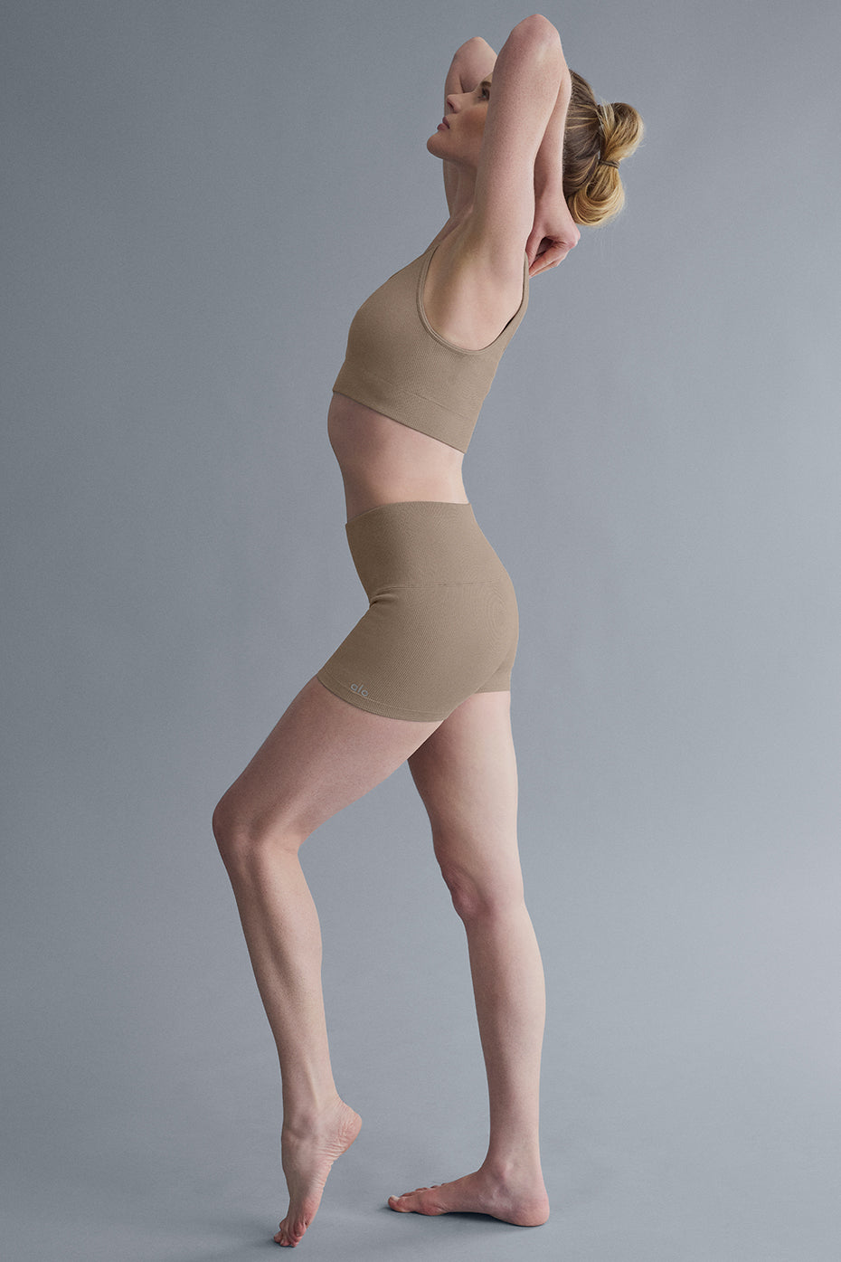 Back view showcasing the high rise design of shimmer shorts