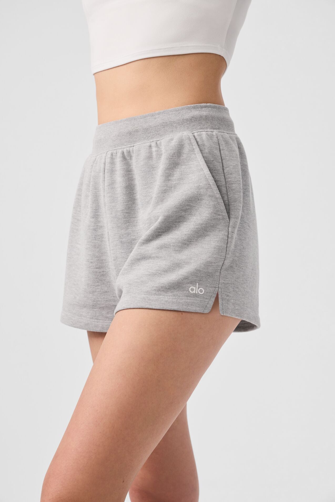 Model wearing French terry sweat shorts paired with a stylish hoodie.