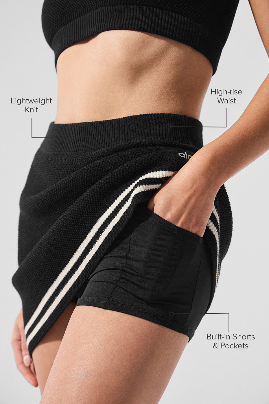 Side view of the activewear skirt, highlighting the built-in shorts and A-line fit.