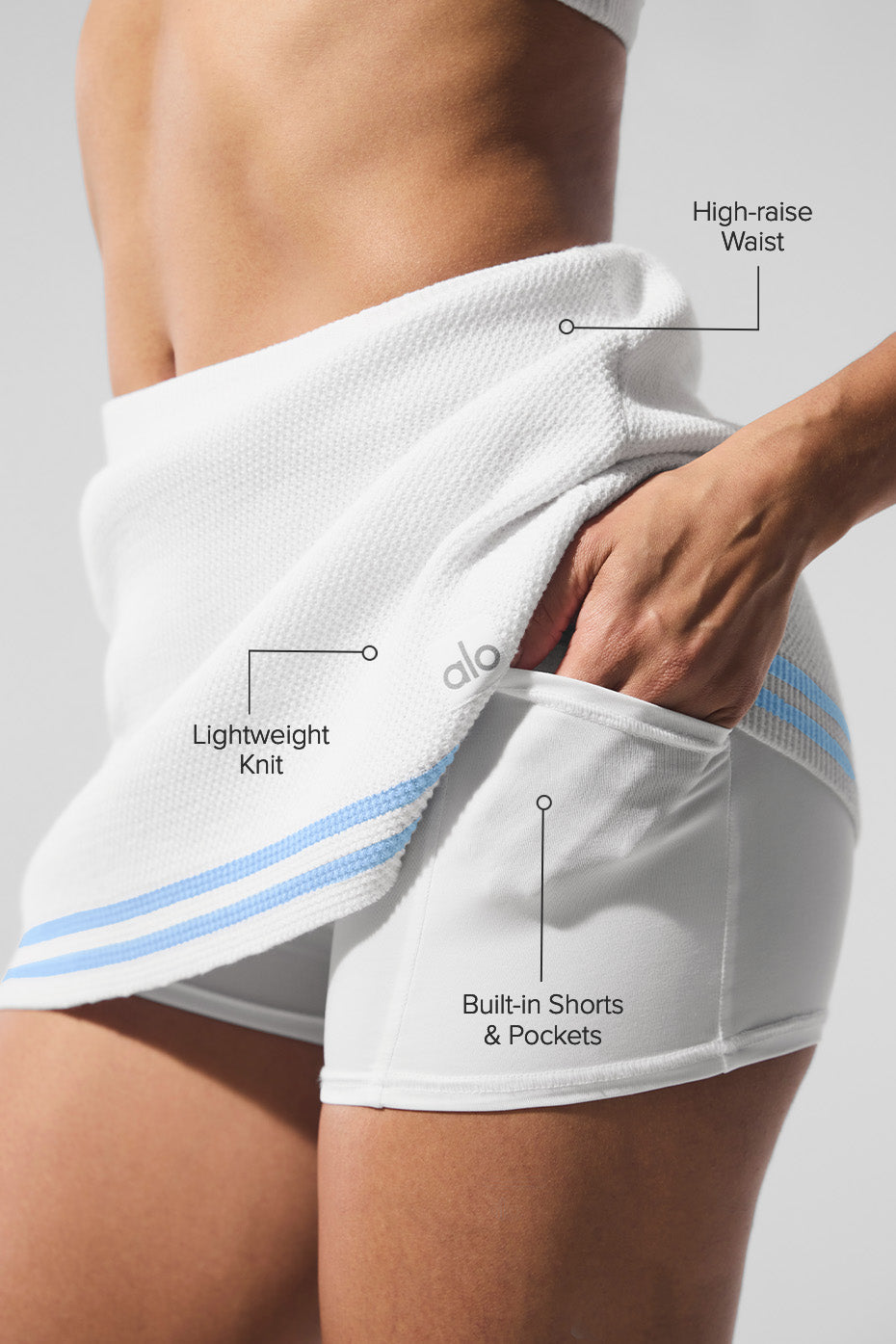 Side view showcasing the A-line fit of the pleated tennis skirt.