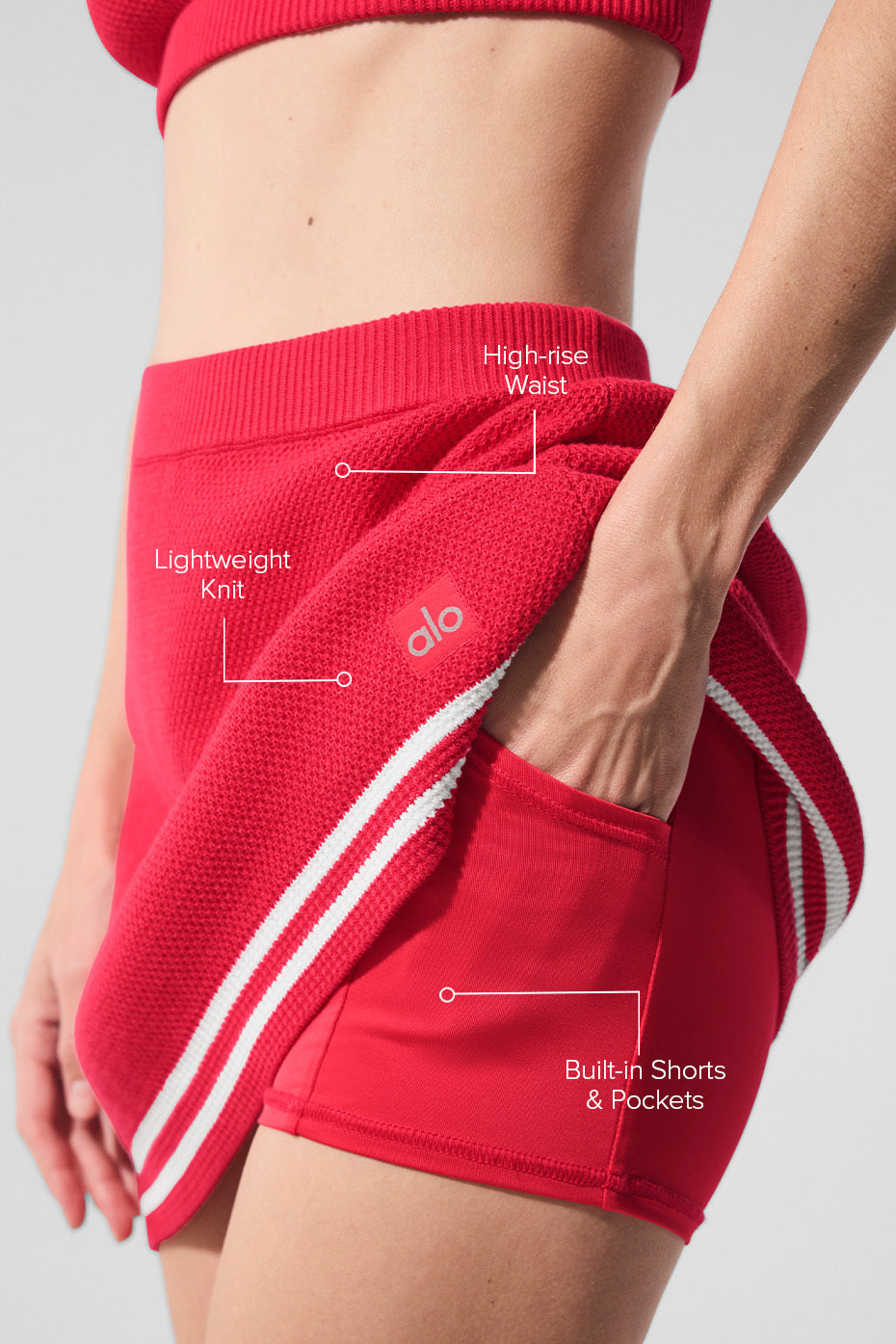 Close-up of fabric texture and built-in shorts for activewear comfort.
