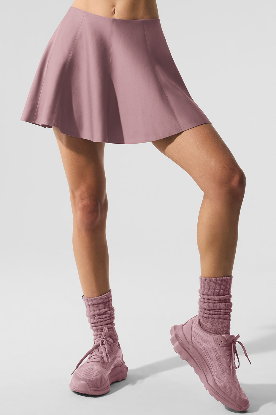 Close-up of the fabric and construction of the tennis skirt showing breathable Airlift material