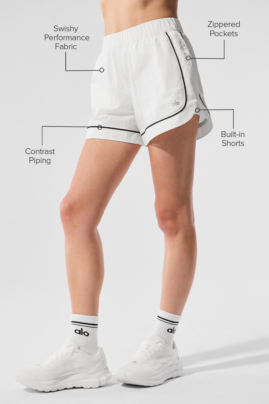 Athlete jogging in women’s sports shorts on urban trail