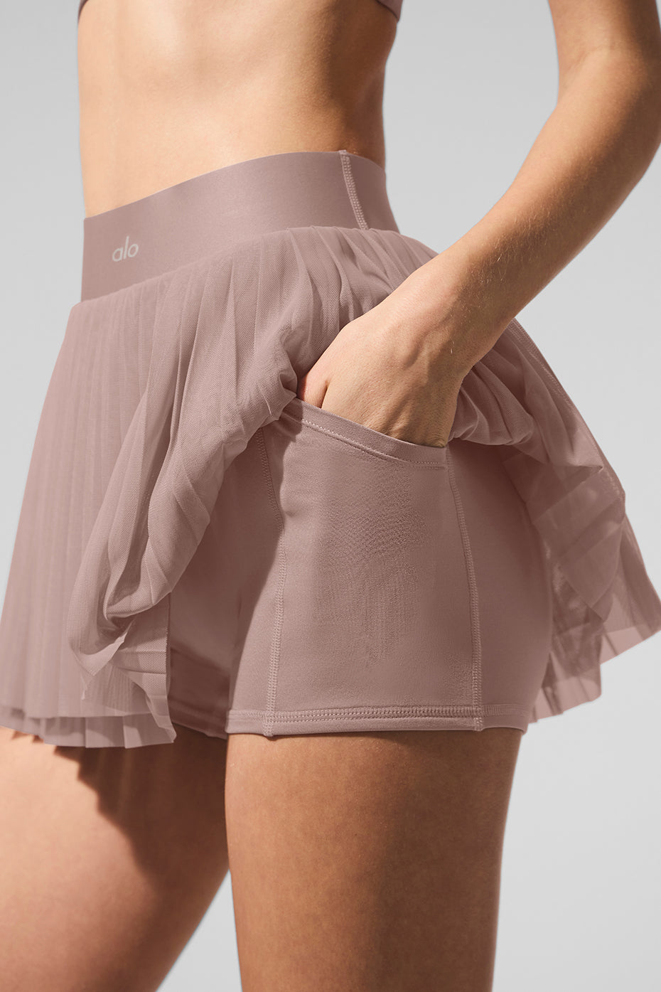 Side view of the tennis skirt highlighting the Airlift waistband and built-in shorts.