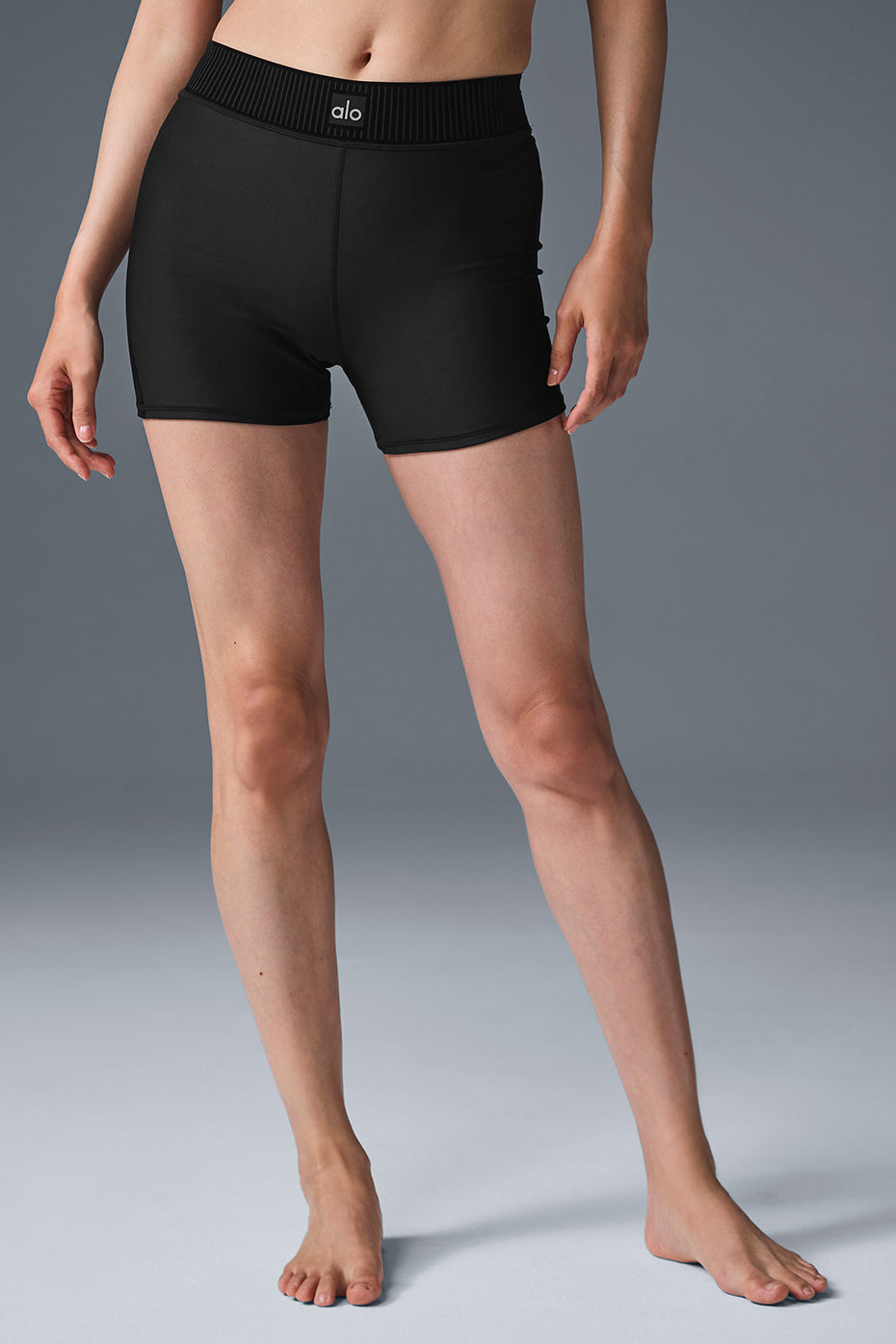 Close-up of Airlift high-waist shorts showing velvet waistband detail