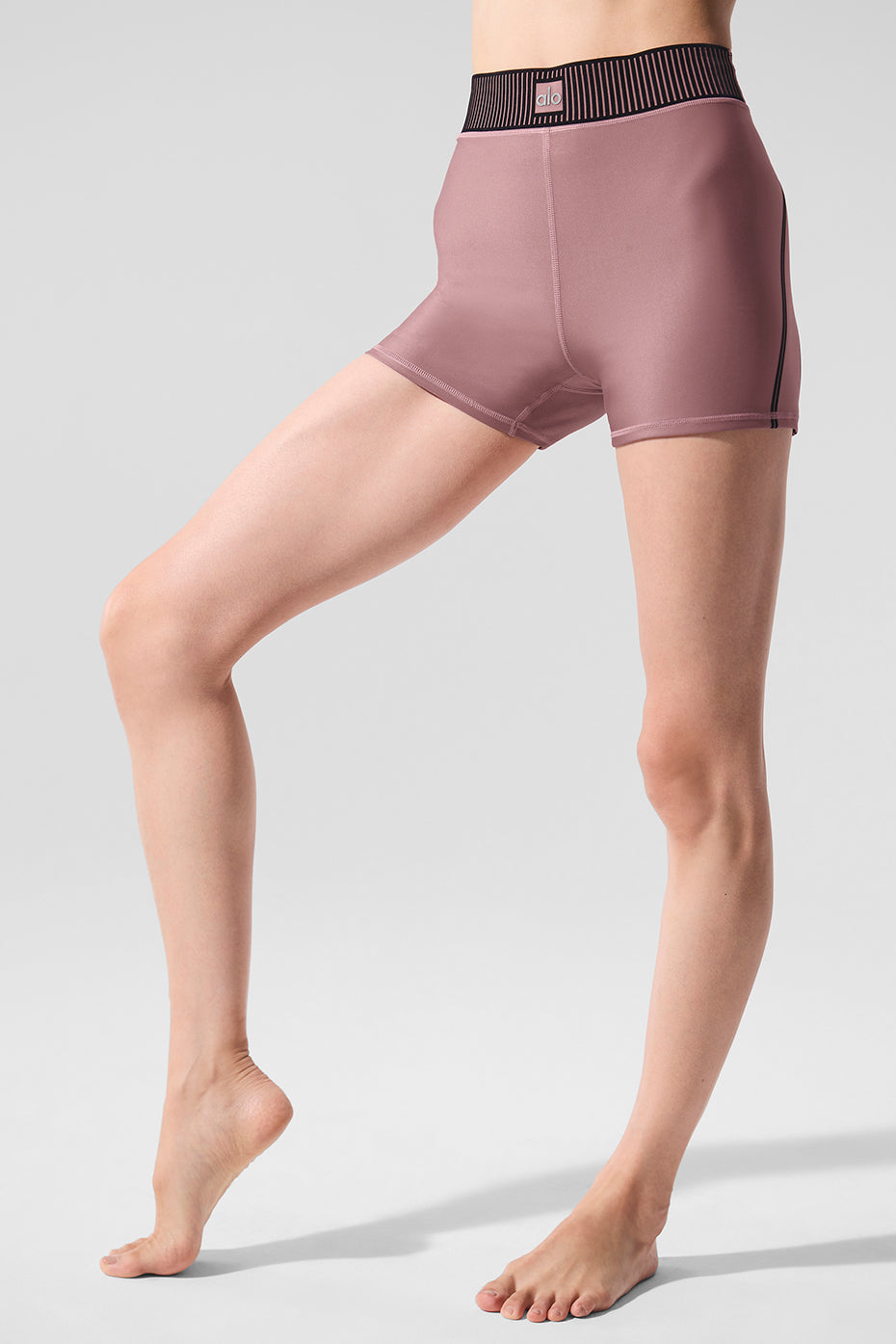 Front view of Airlift high-waisted workout shorts in Smoky Quartz.
