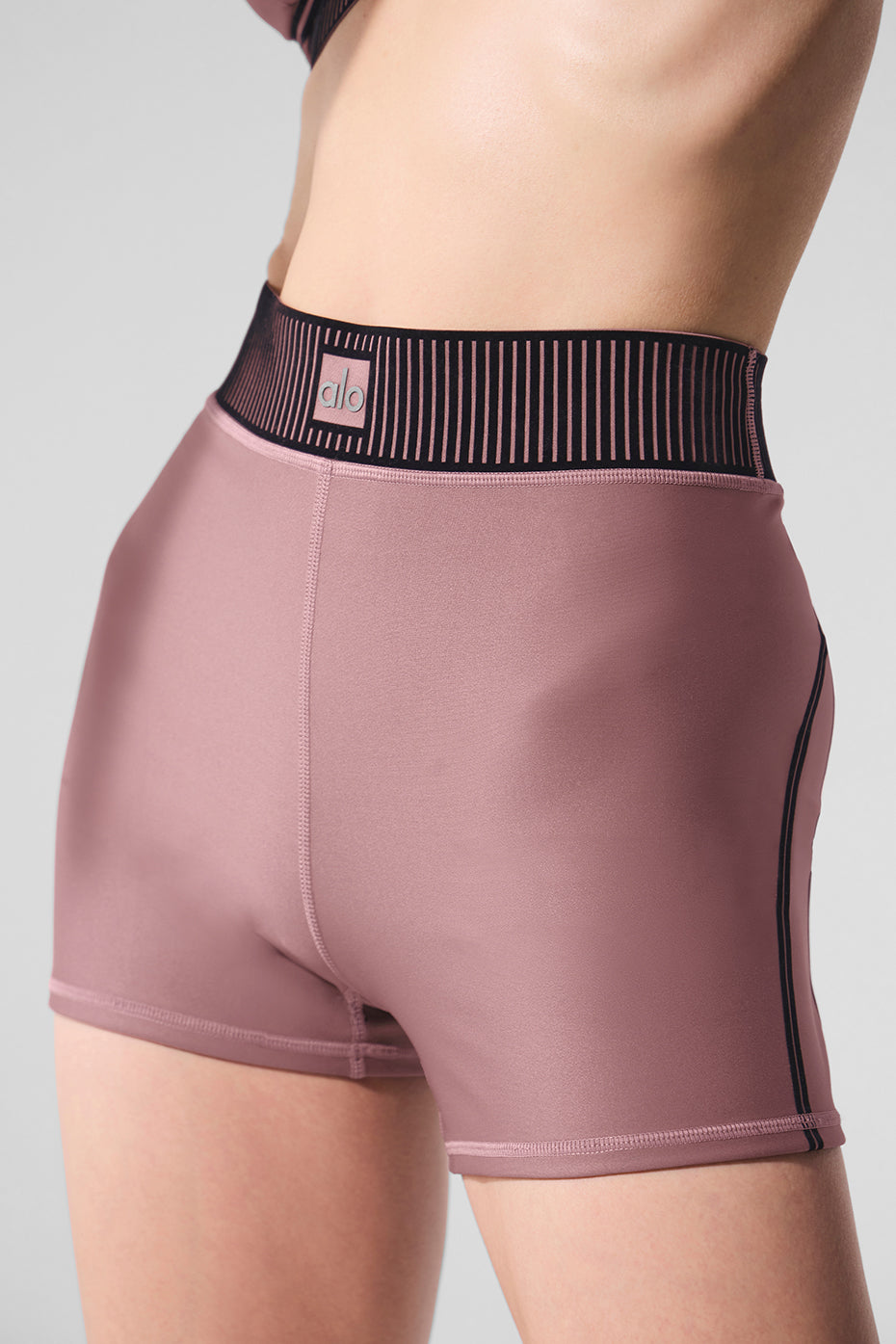 Back view showcasing the sweetheart detailing of the high waist workout shorts.