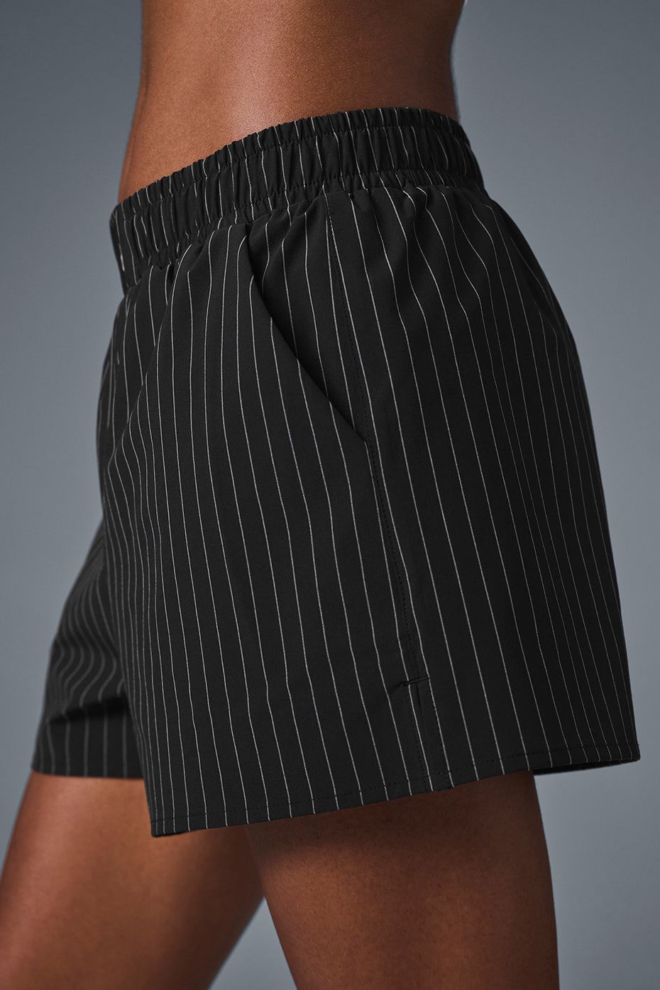 Front view of mens pinstripe boxer shorts showcasing the stretchy waistband.