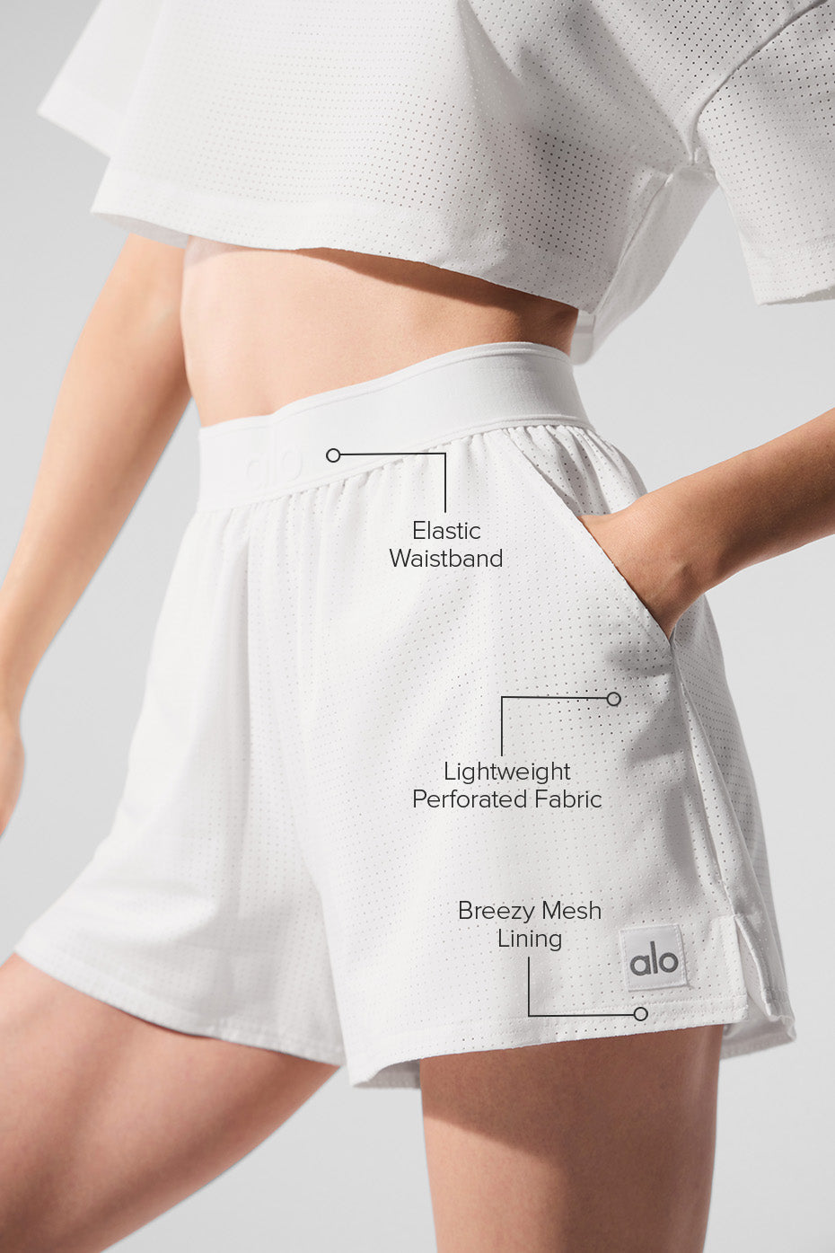 Side view showcasing the lightweight fabric of white linen shorts.