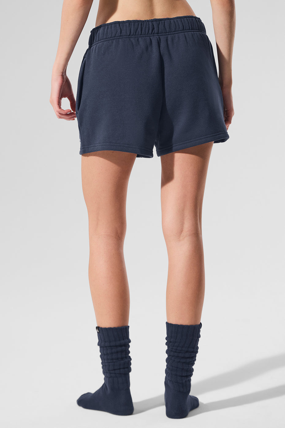 Navy Accolade shorts styled with a cozy short robe for relaxing at home