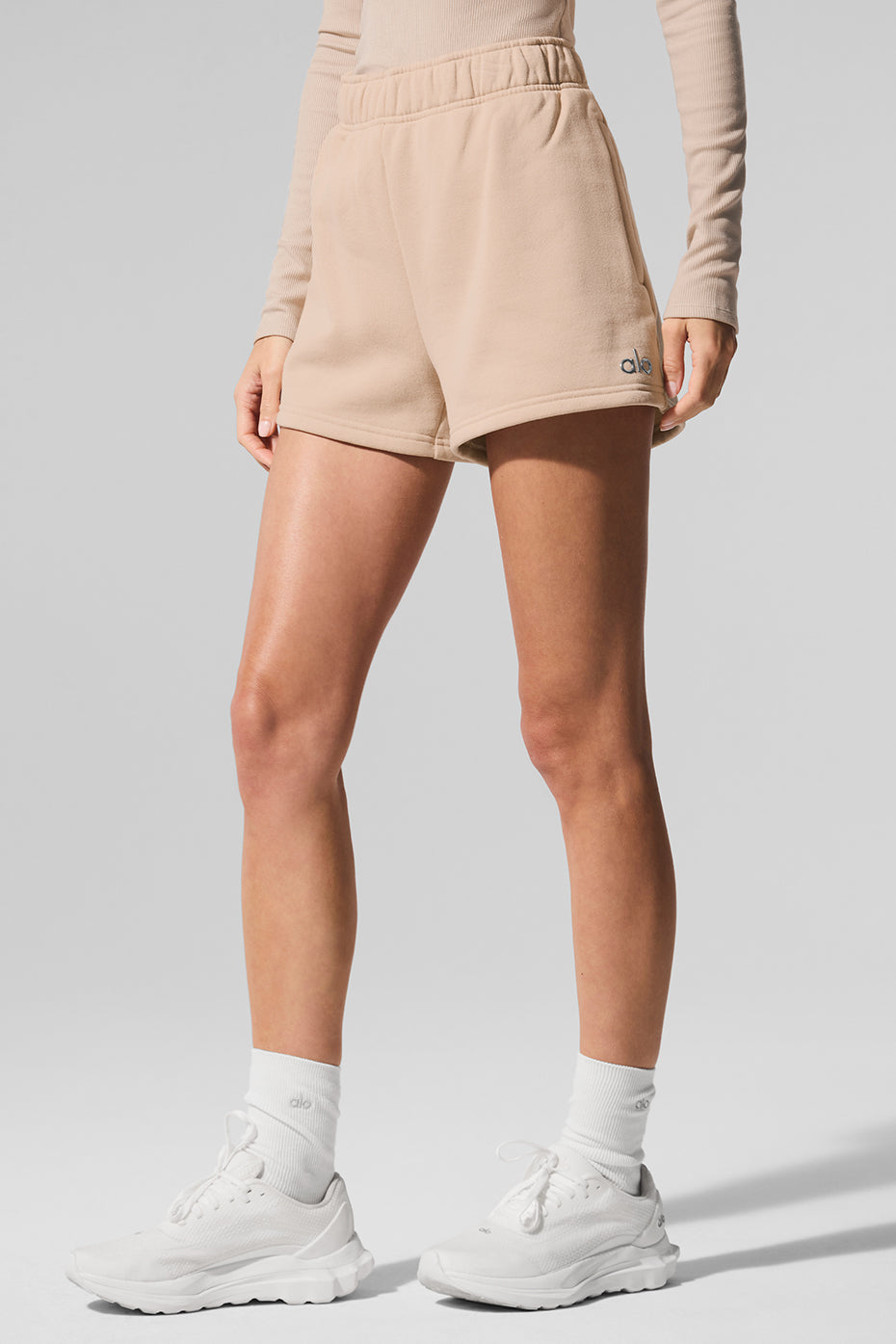 Model wearing Macadamia cozy shorts paired with a relaxed top for a comfortable look