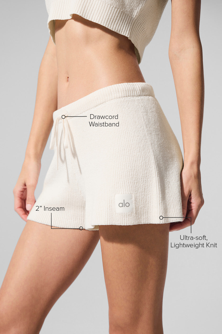 Close-up of the lightweight knit of the Ivory sweater shorts.