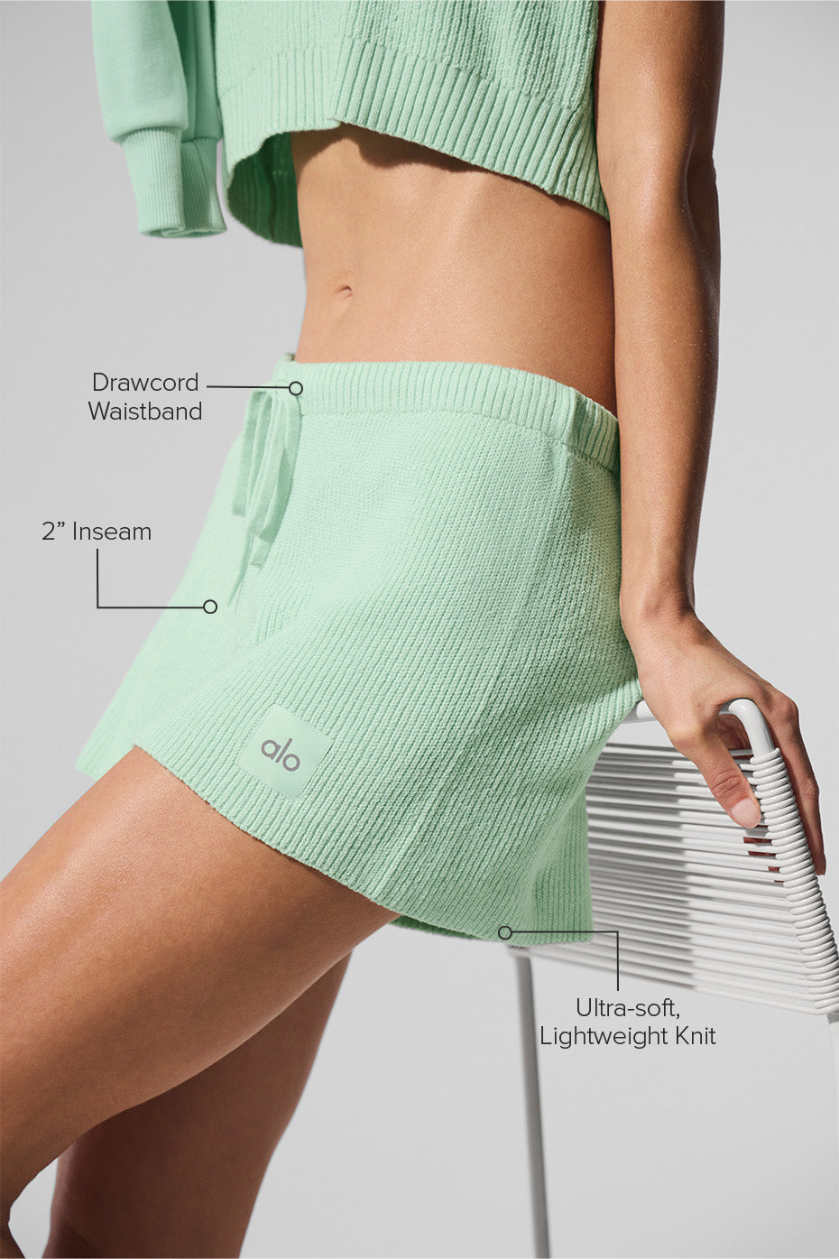 Model wearing sweater shorts with a short sleeve sweater