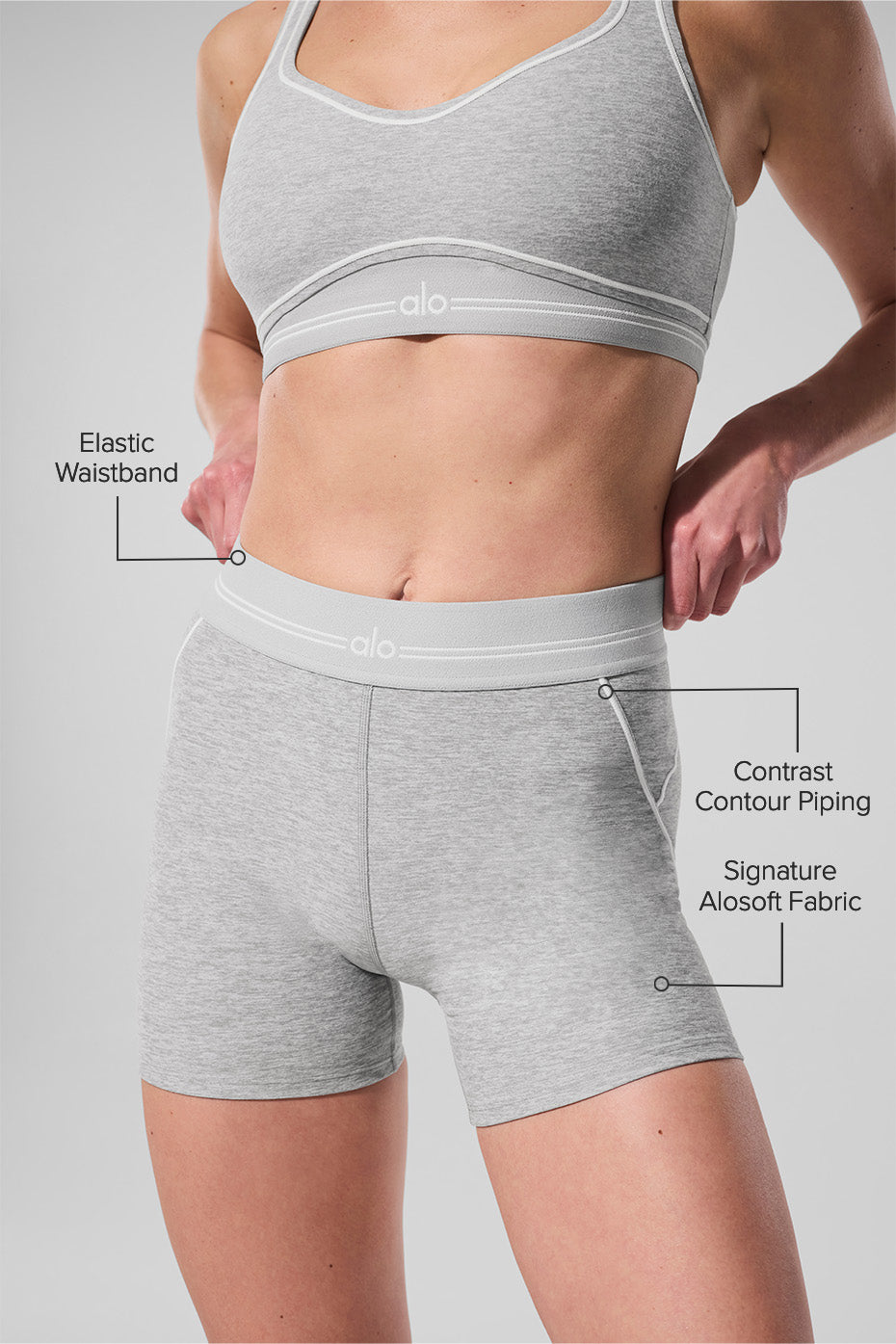 Model wearing buttery Alosoft shorts with a high waist, ideal for workouts or leisure.