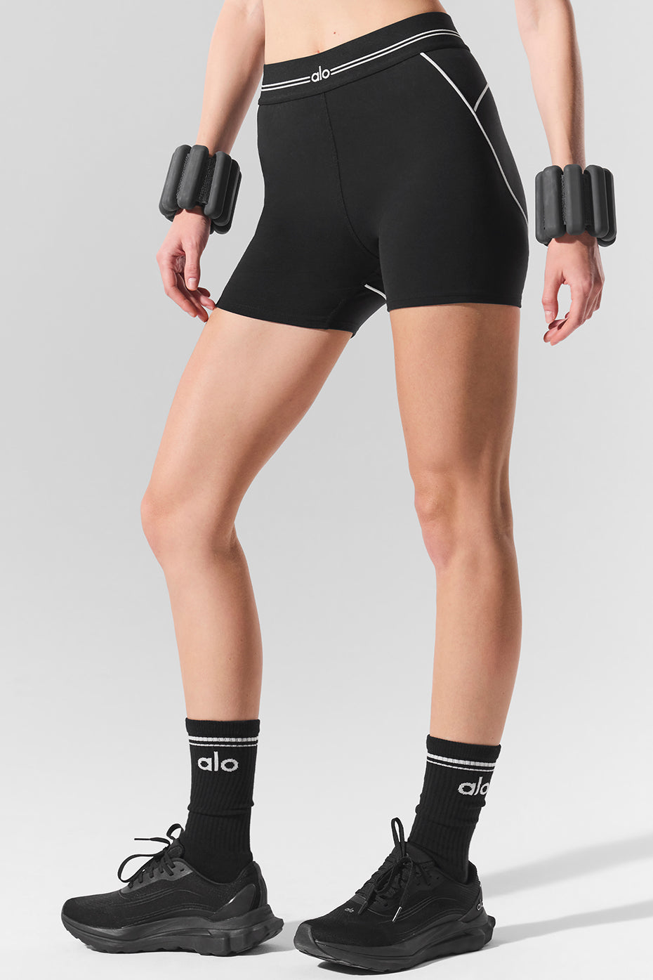 Womens workout shorts worn during casual walk in West Coast city park.