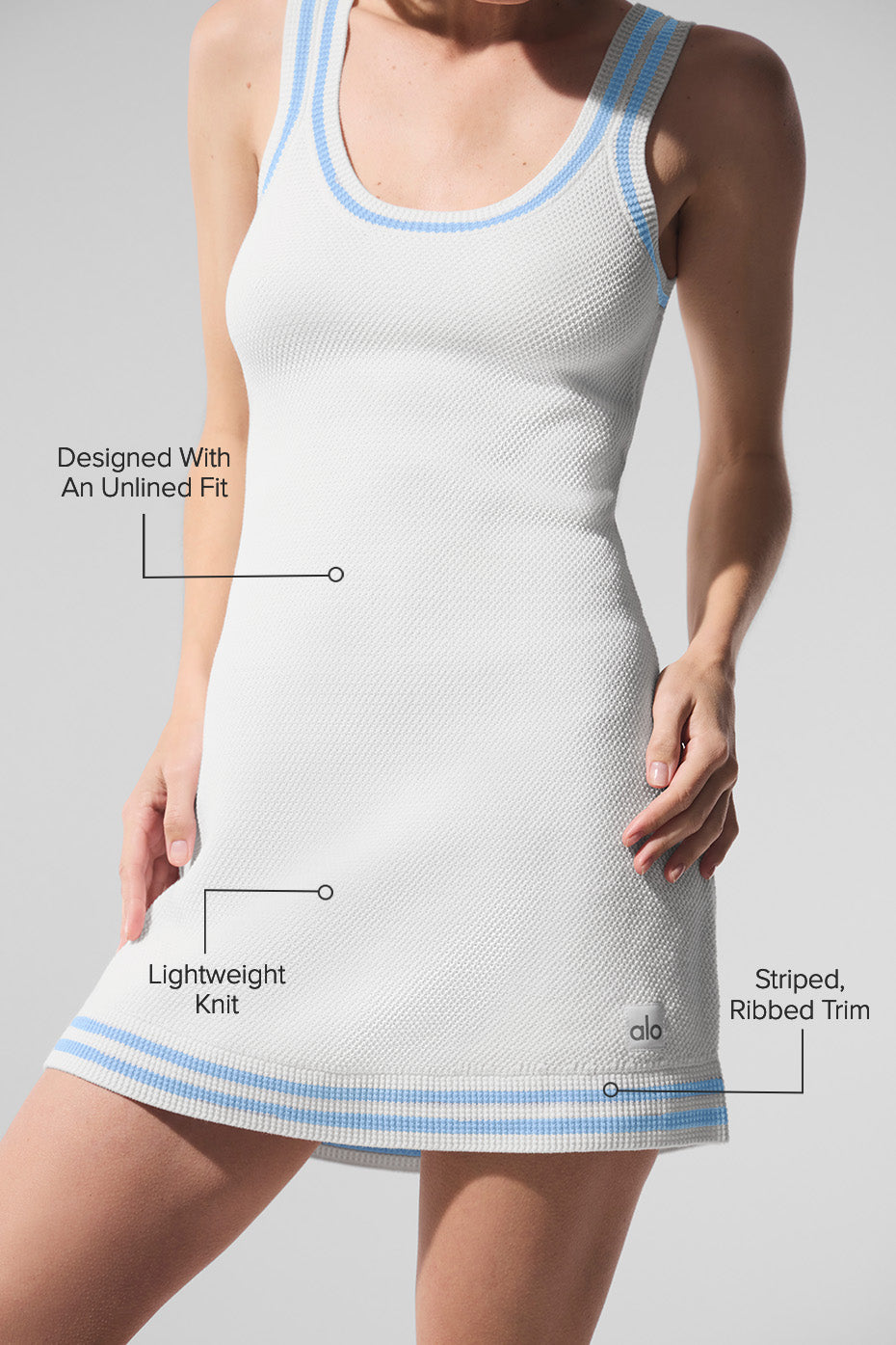 Side view of the Wilson tennis dress highlighting the striped trim and body-skimming fit.