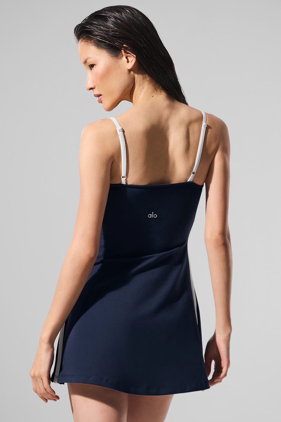 Back view of the Wilson womens tennis dress showcasing its A-line fit.