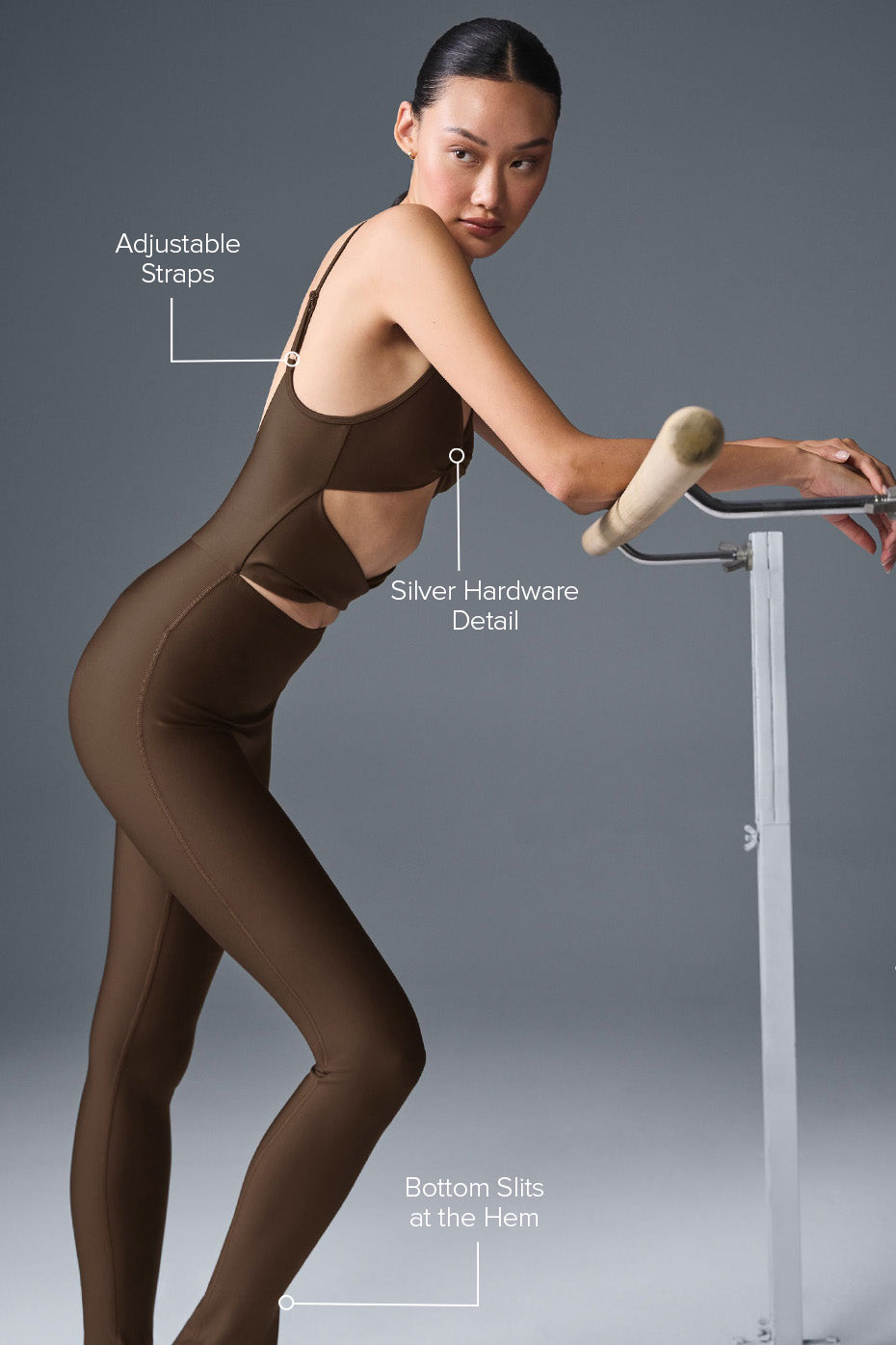Side pose highlighting scooped back and flexible fabric