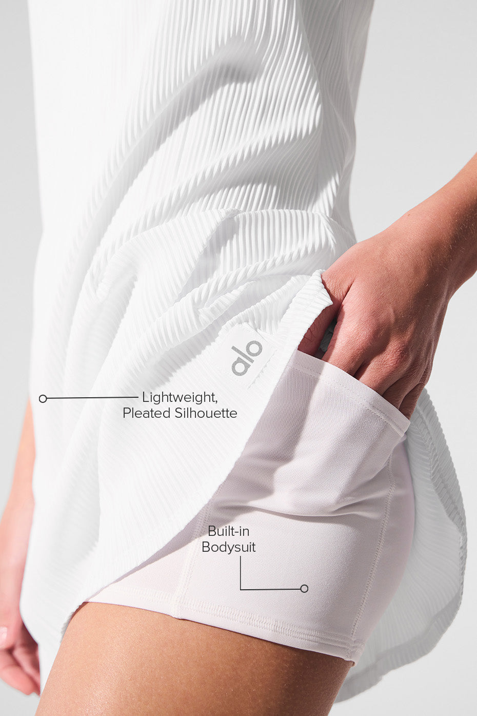 Back view of the white tennis dress highlighting adjustable straps.