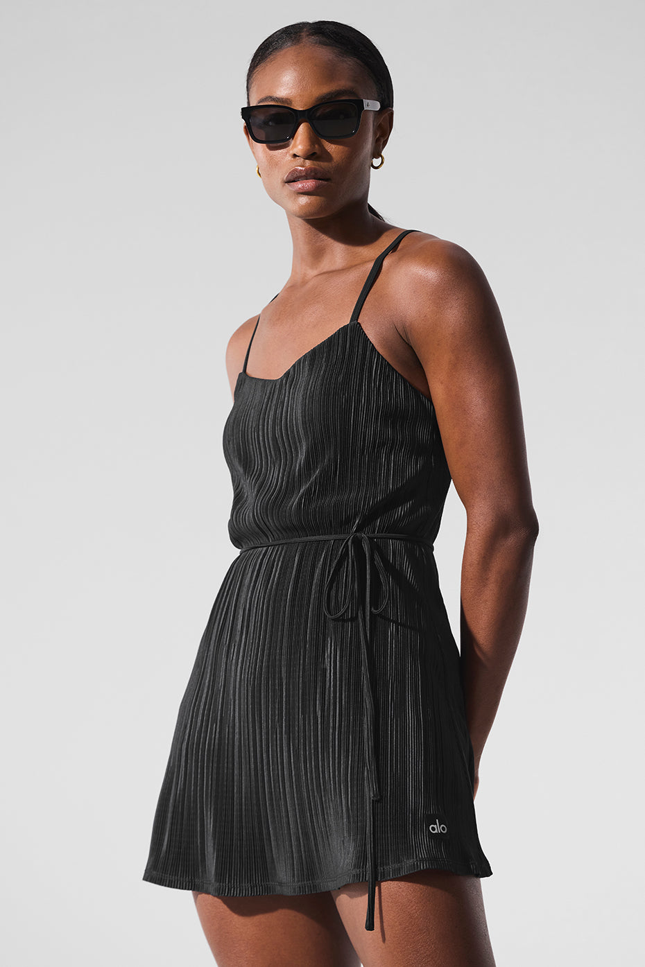 Back view of the Wilson tennis dress with a removable tie belt for a tailored fit.