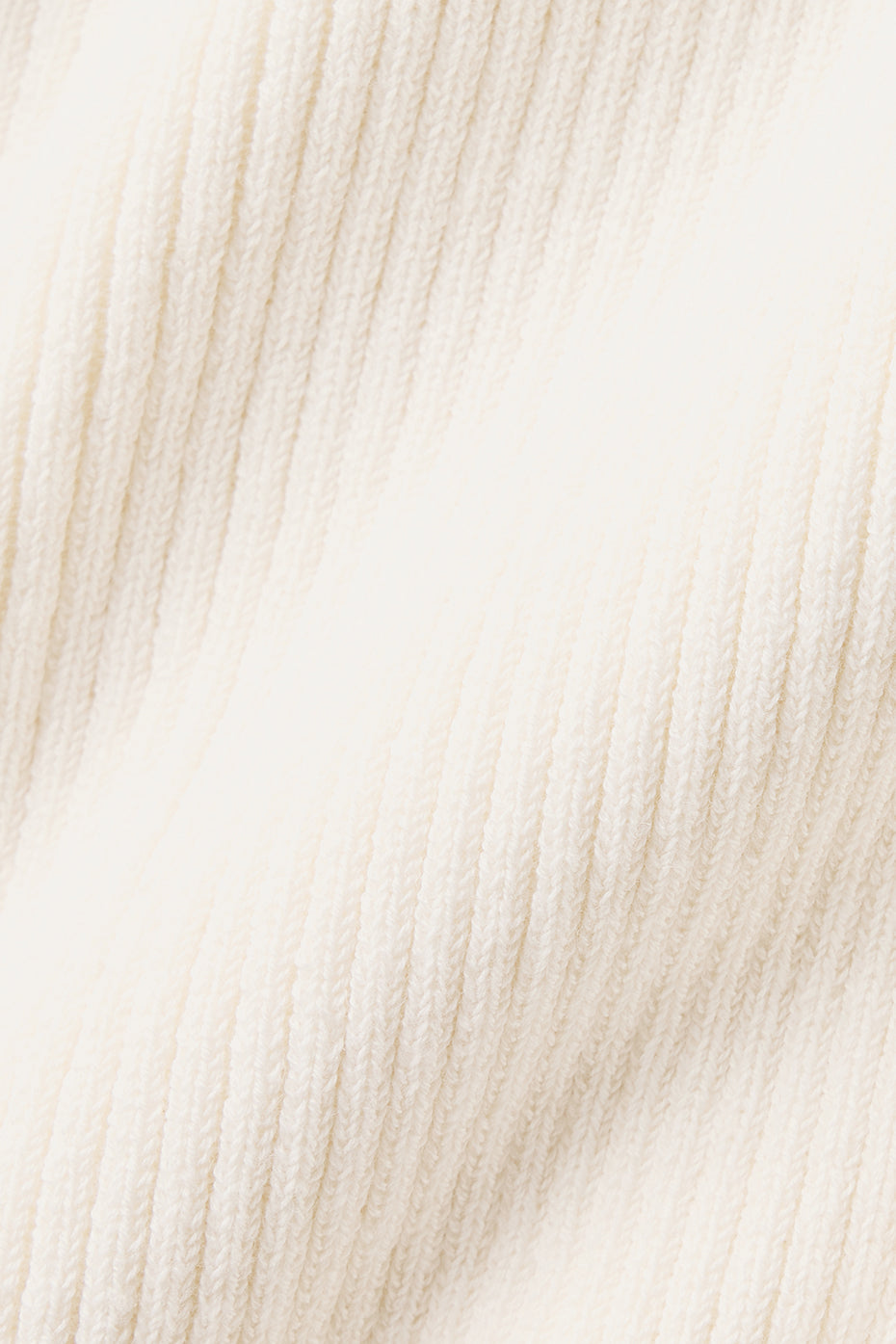 Front view of the ivory lightweight knit maxi dress styled for summer