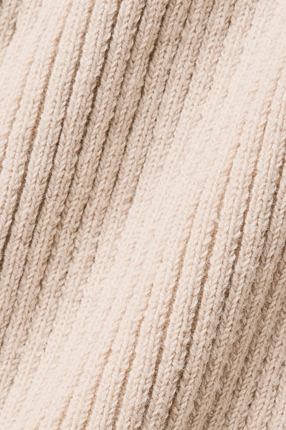 Close-up of the breathable fabric and relaxed fit of the sweater dress