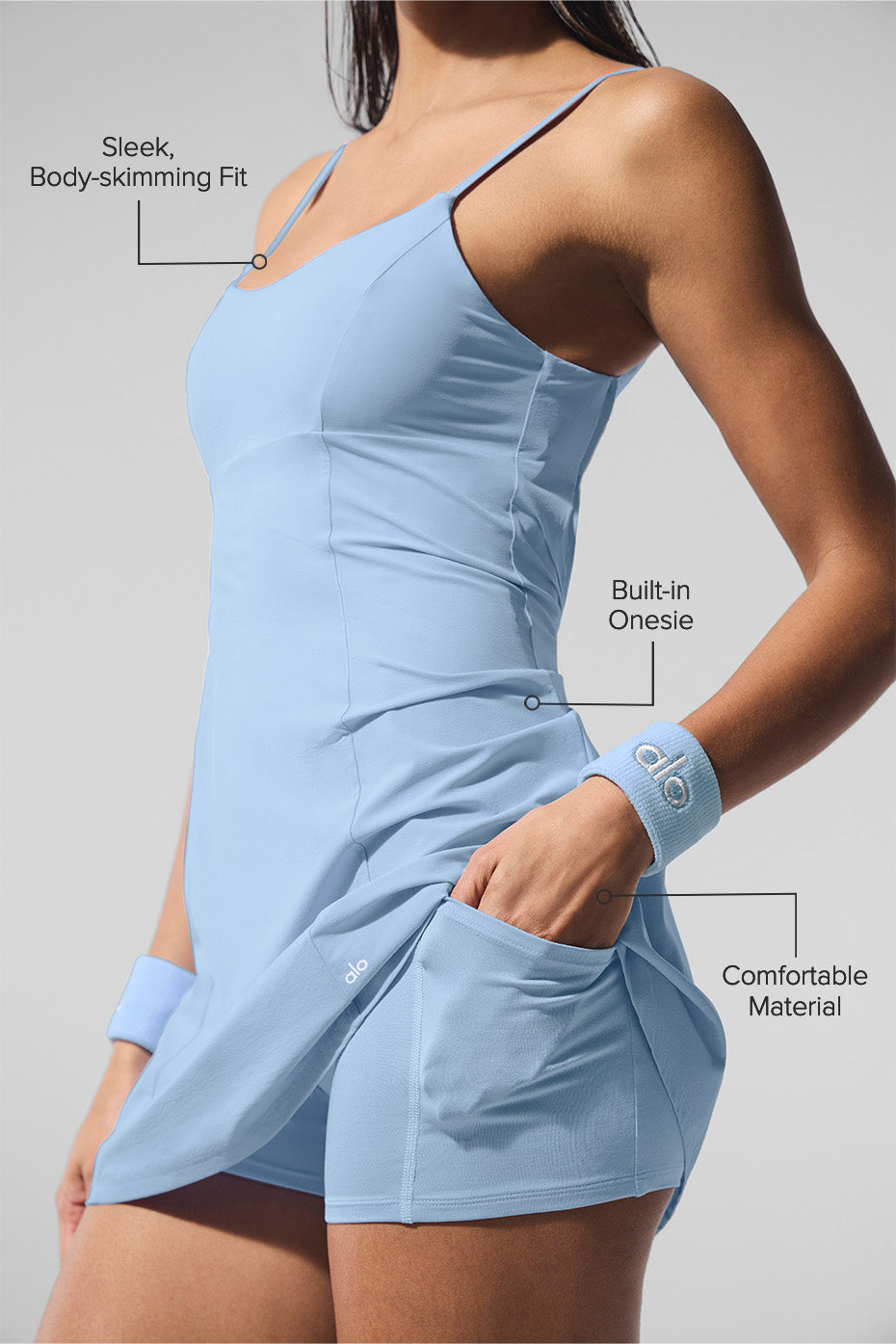 Back view of the womens tennis dress highlighting the chic scooped back.
