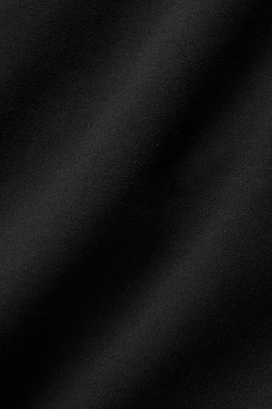 Close-up of the fabric texture of the ALO Softsculpt Halter Tennis Dress.
