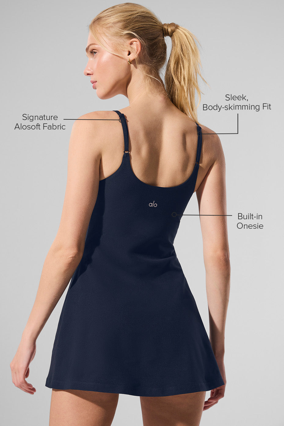 Side angle of Alosoft tennis dress showing built-in shorts under skirt