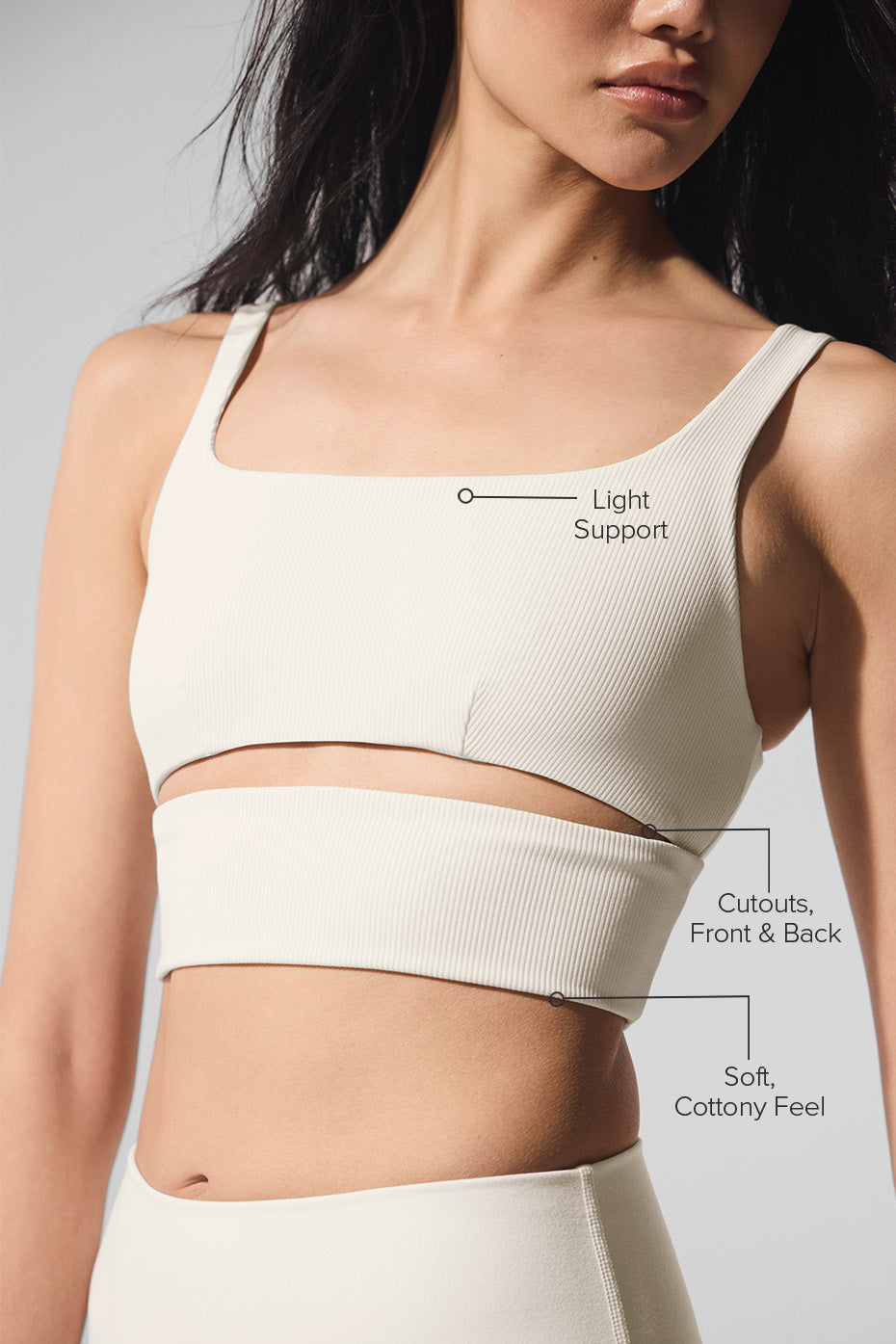 Back angle of ivory slit bra showing ventilation cutouts for active comfort