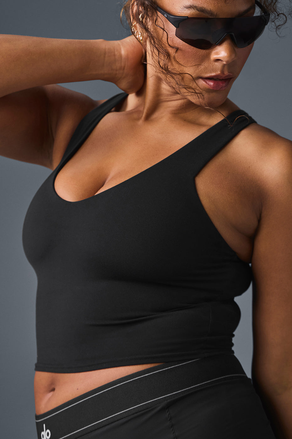 Side view showcasing the racerback design of the tank top.