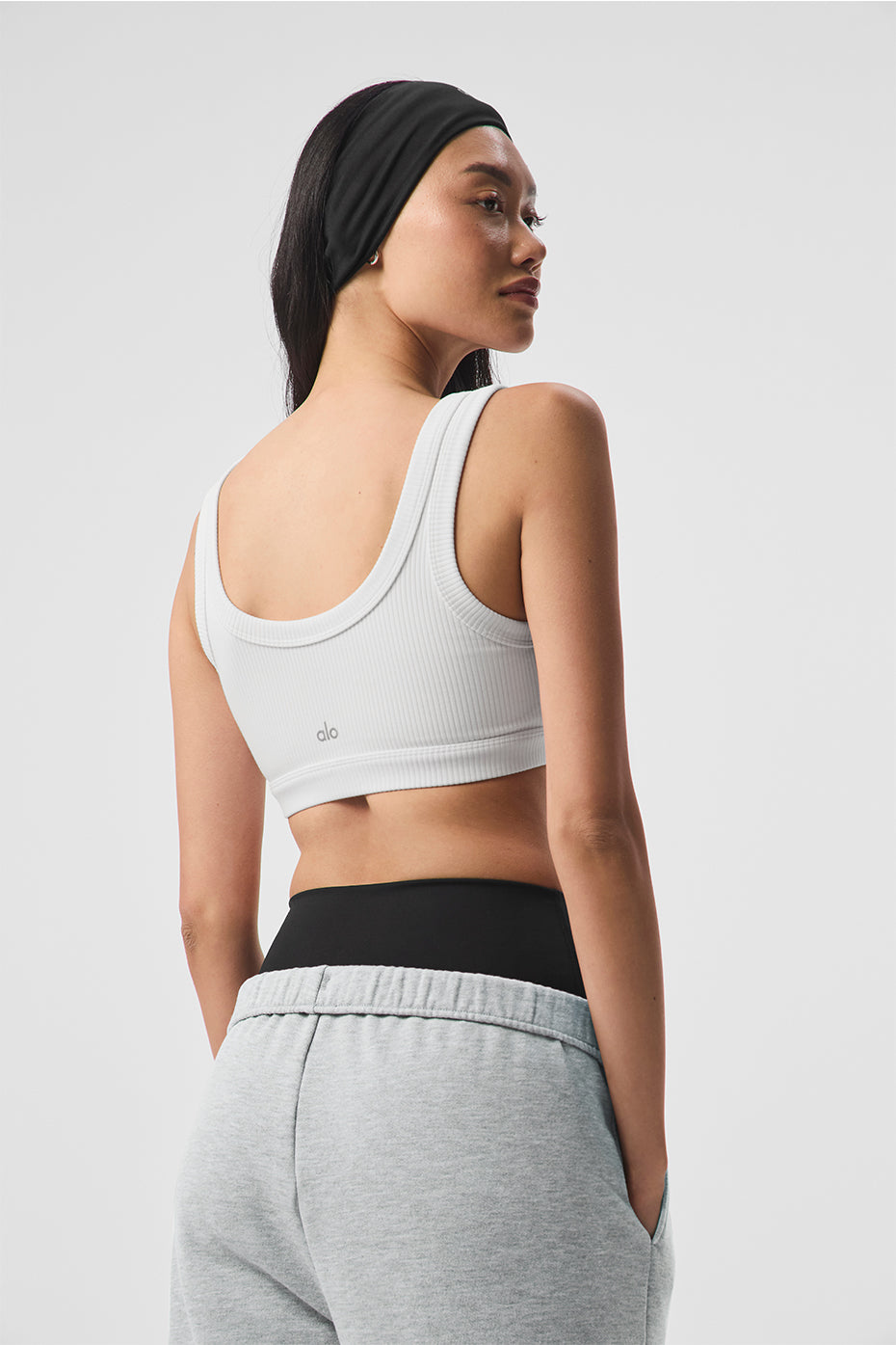 Side view of the Empower Activewear Bra, highlighting the ribbed fabric and removable cups.