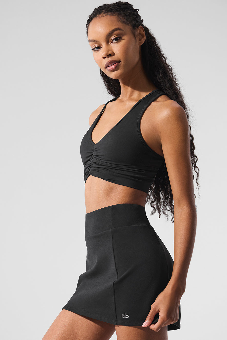 Model demonstrating support and style in the Wild Thing crop top during a workout