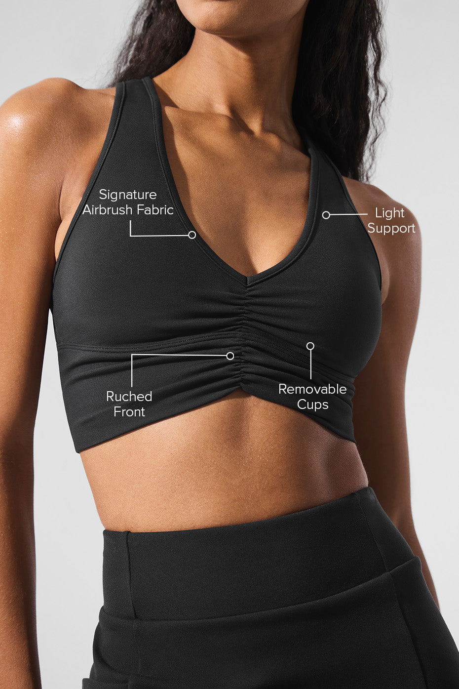 Flat lay of the Wild Thing crop top highlighting breathable Airbrush fabric and trendy design
