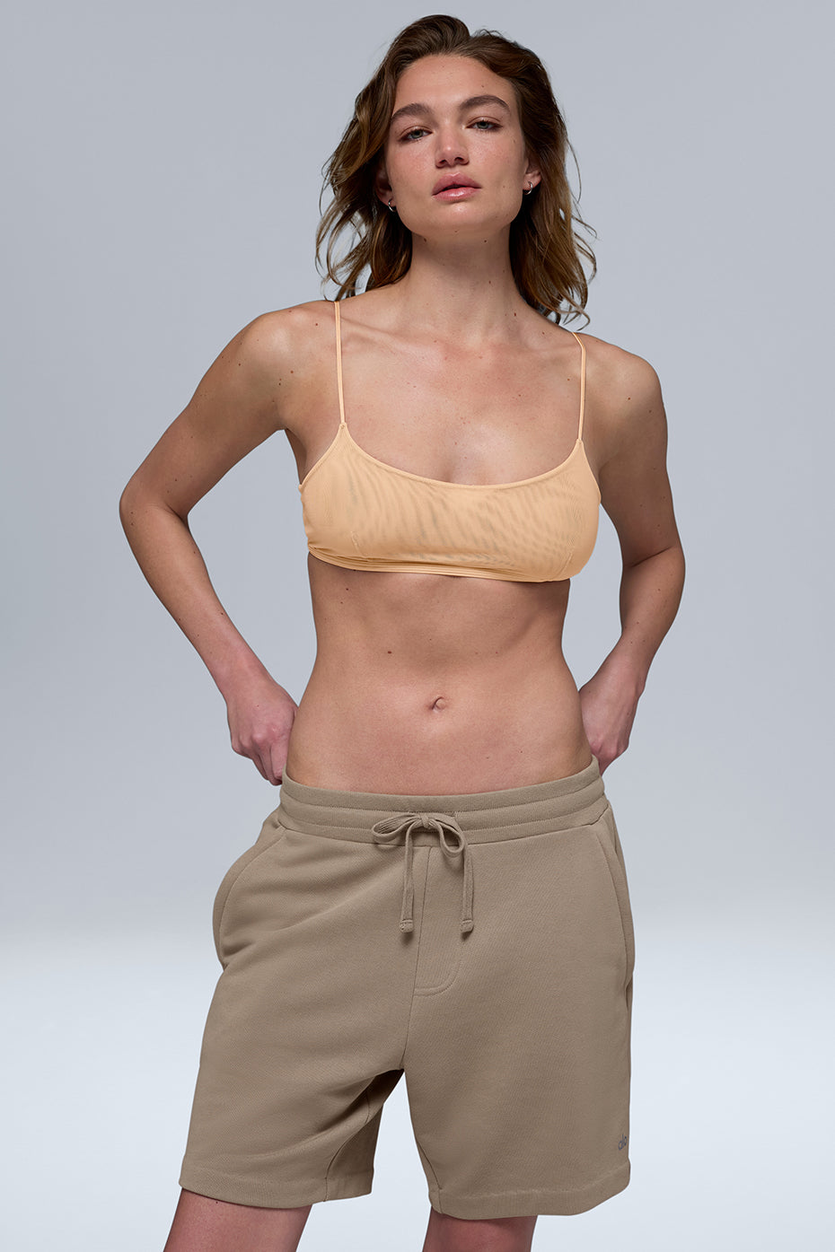 Close-up of mesh bralette showcasing breathable texture and champagne hue