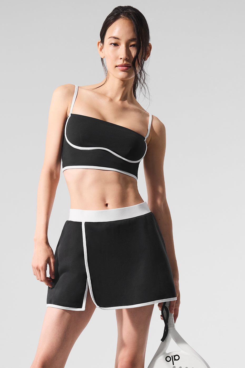 Black and white sports bra sports tank with contrast piping on straps