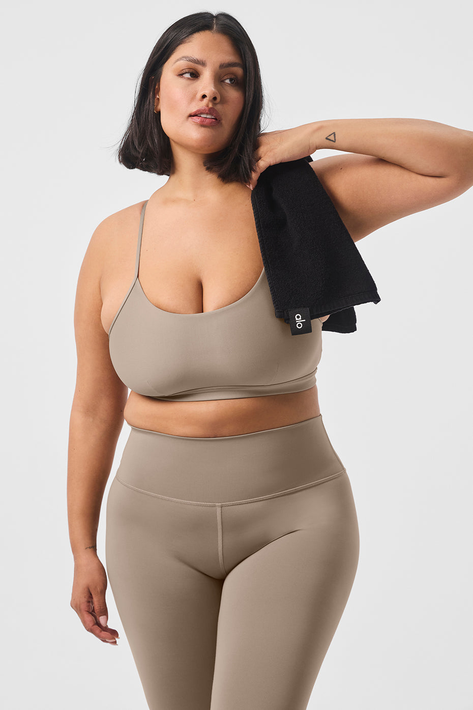 Active woman wearing the Airlift Intrigue Bra during a workout session